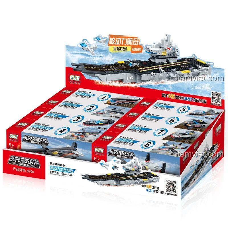 Hộp sản phẩm bộ lắp ráp GUDI 8709 Hàng không mẫu hạm hạt nhân, thể hiện thiết kế 8 trong 1 và hình ảnh tàu sân bay lớn.