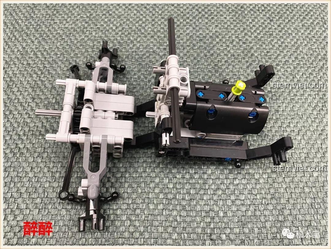 Lắp ráp hệ thống truyền động và động cơ mô phỏng của xe tải địa hình Happy Build 1211, mang lại trải nghiệm lắp ghép chân thực.