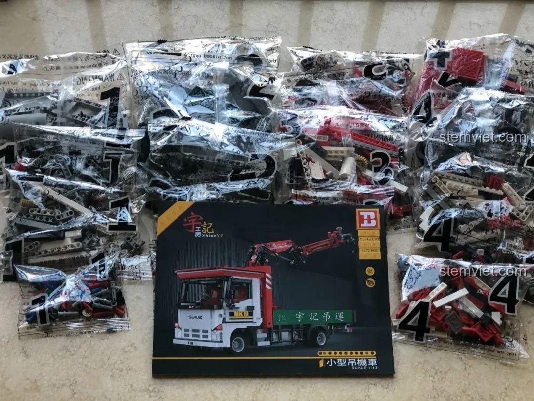 Các túi mảnh ghép được sắp xếp gọn gàng bên trong hộp HAPPY BUILD YC-GC007.