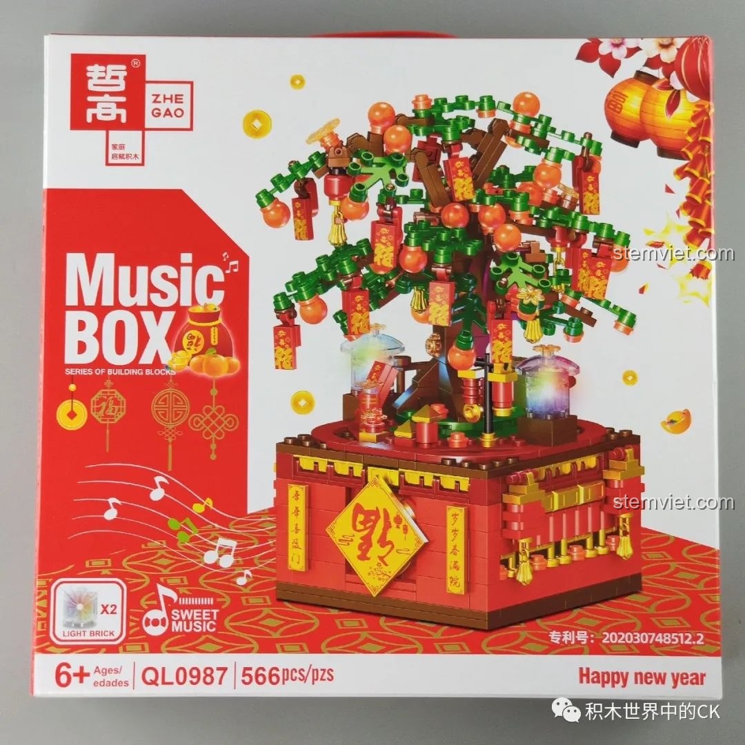 Hộp sản phẩm Hộp nhạc Cây Phát Tài ZHEGAO QL0987 với thiết kế Tết rực rỡ, có hình ảnh cây phát tài và hộp nhạc.