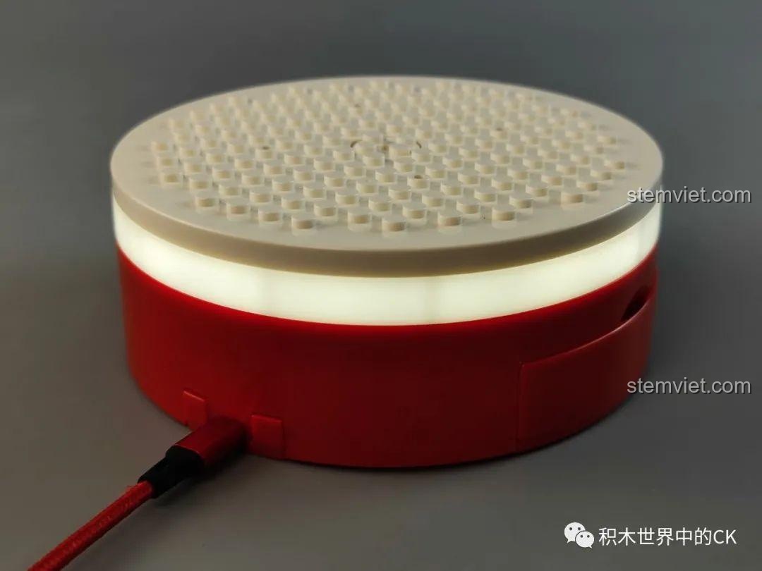 Hộp nhạc lắp ráp Meiji Blocks 23001 với vòng đèn LED sáng rực.