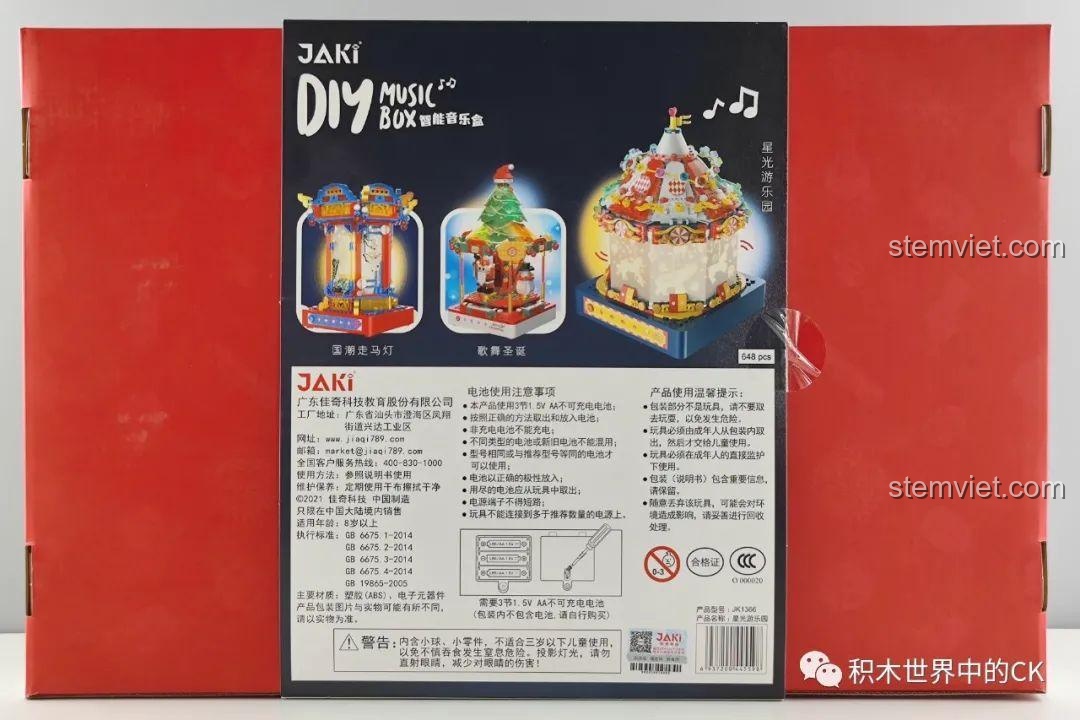 Mặt sau hộp Hộp nhạc thông minh Công viên giải trí ánh sao JAKI JK1366, hiển thị thông tin sản phẩm và cảnh báo an toàn. Đánh giá JAKI JK1366 Đồ chơi hộp nhạc DIY.