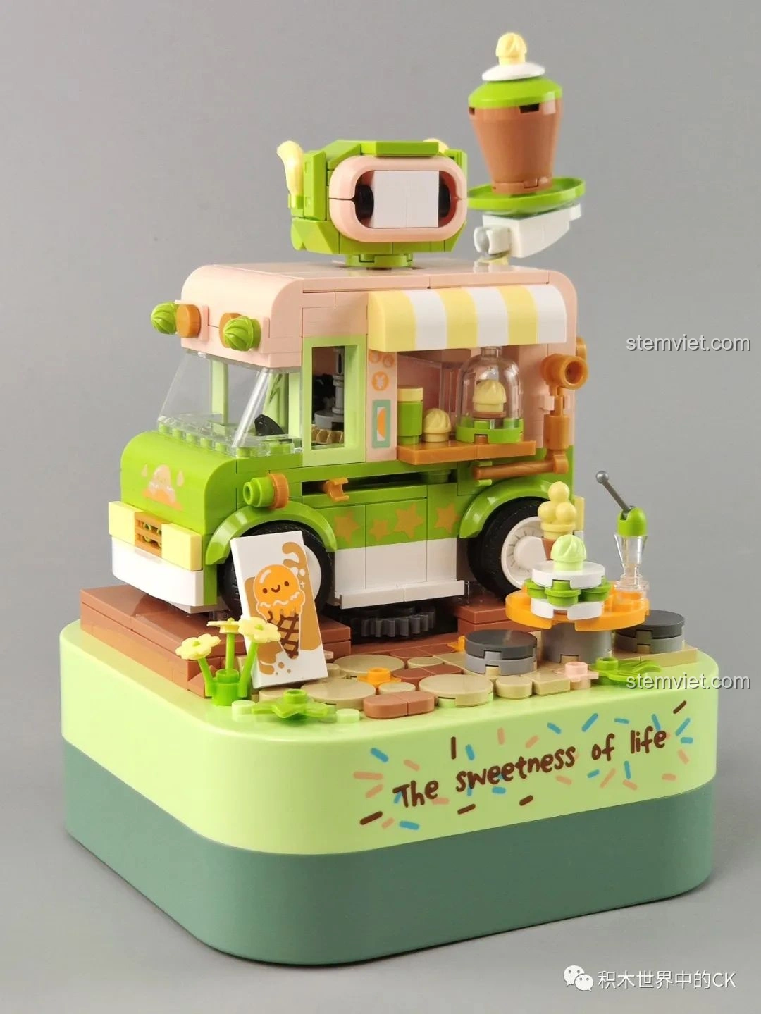 Mặt sau mô hình hộp nhạc xe kem ngọt ngào JK1605 JAKI, tay quay hình bánh quy