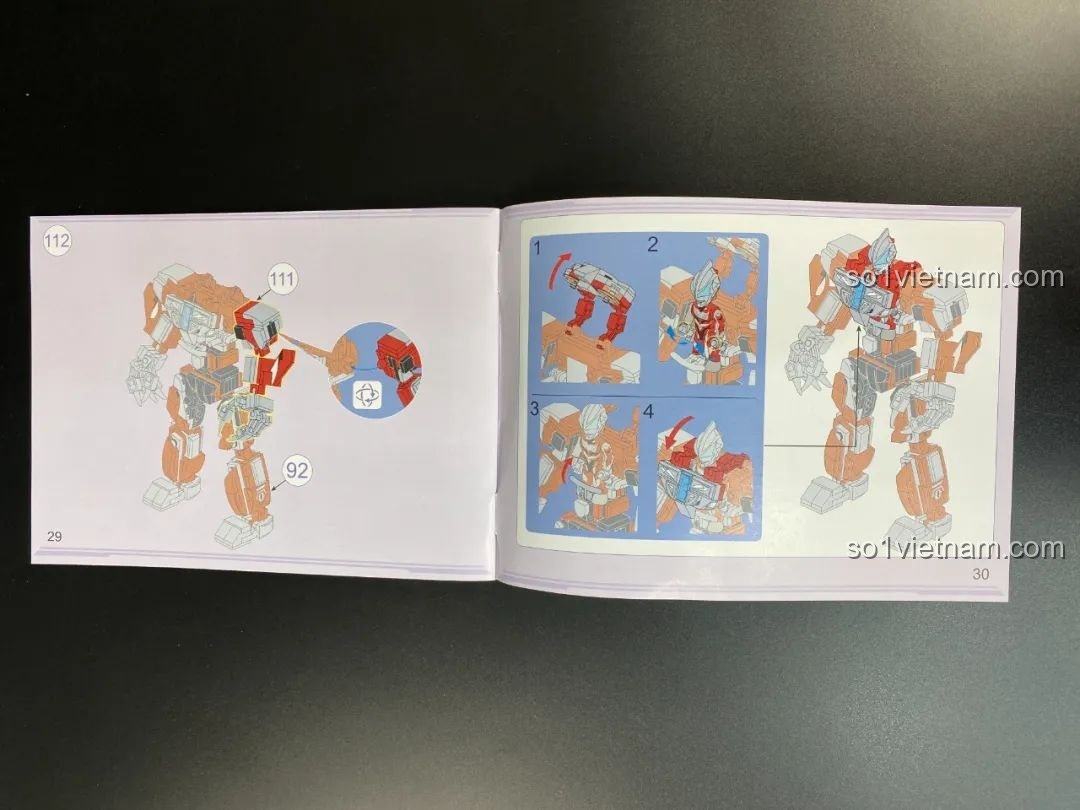 Trang hướng dẫn lắp ráp phần thân và buồng lái của mecha Qman Ultraman Geed, cho thấy các bước phức tạp hơn.