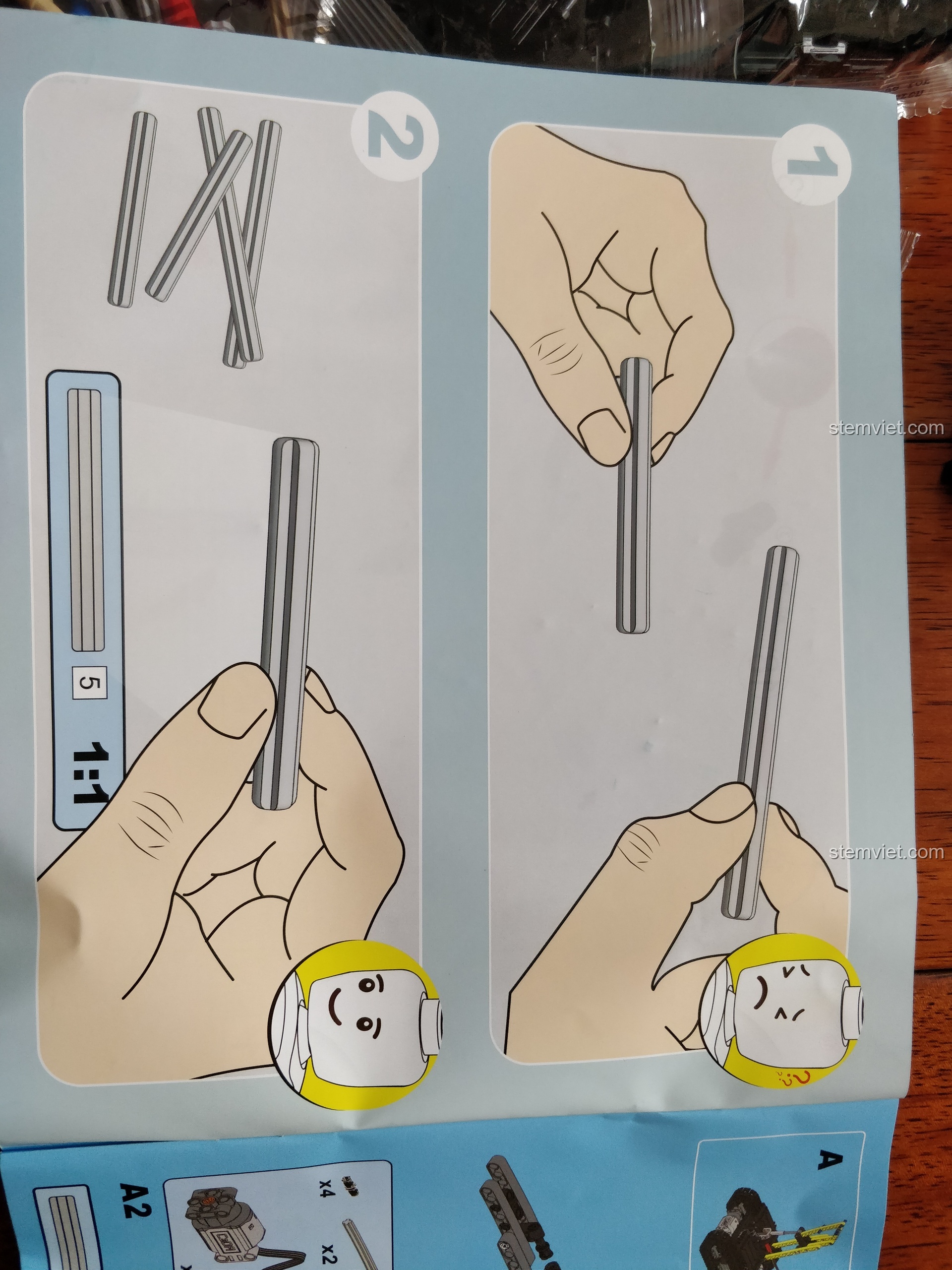 Trang hướng dẫn với tỉ lệ 1:1 cho các trục trong bộ lắp ráp Máy xúc kỹ thuật Technic CaDA giá bình dân.