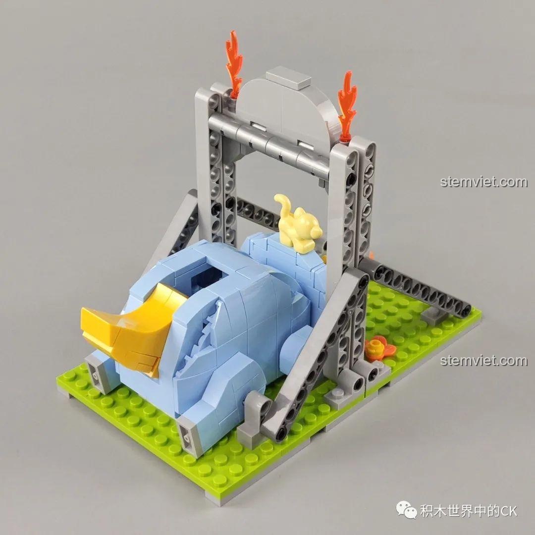 Ảnh unboxing bộ đồ chơi lắp ráp khung ảnh khủng long ba sừng JAKI JK5105, hiển thị các túi mảnh ghép và sách hướng dẫn.