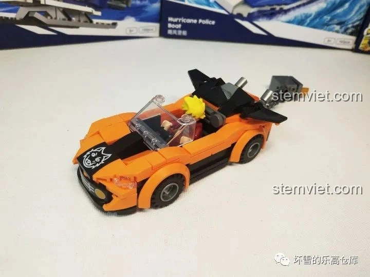 Mô hình xe Đại Đạo Tốc Độ của JAKI Vệ Binh Tiên Phong đã hoàn thành, với nhân vật đại đạo ngồi trong xe và két sắt phía sau.