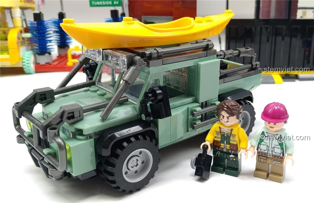 Ảnh review bộ lắp ráp Jia Zhi SY 5120 Xe Jeep Dã Ngoại, mô hình hoàn chỉnh với 2 minifigure và thuyền kayak, đồ chơi mô hình chất lượng.