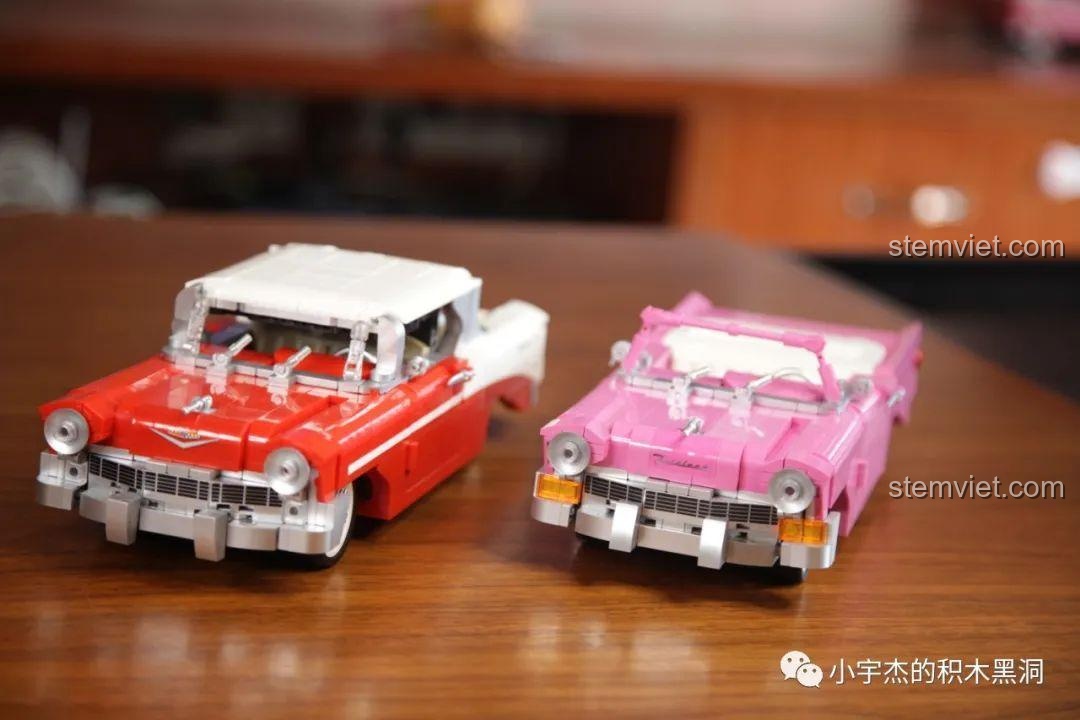 So sánh trực diện mặt trước của hai mô hình Chevrolet, phiên bản hồng và đỏ.