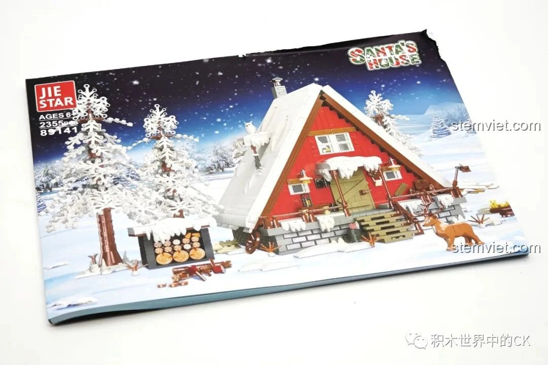 Sách hướng dẫn lắp ráp của bộ JIESTAR 89141 Ngôi nhà Giáng Sinh, với hình ảnh mô hình hoàn chỉnh trên bìa.