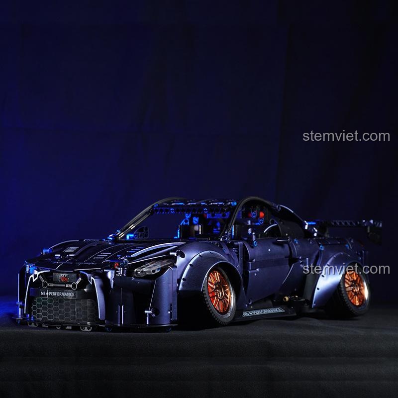 Mô hình K Box 10221 Nissan GT-R tỉ lệ 1:10 màu tím than, thiết kế low-stance, mâm xe mạ điện cam, bộ lắp ghép Nissan GT-R dành cho thanh niên 14 tuổi, giá tiết kiệm.