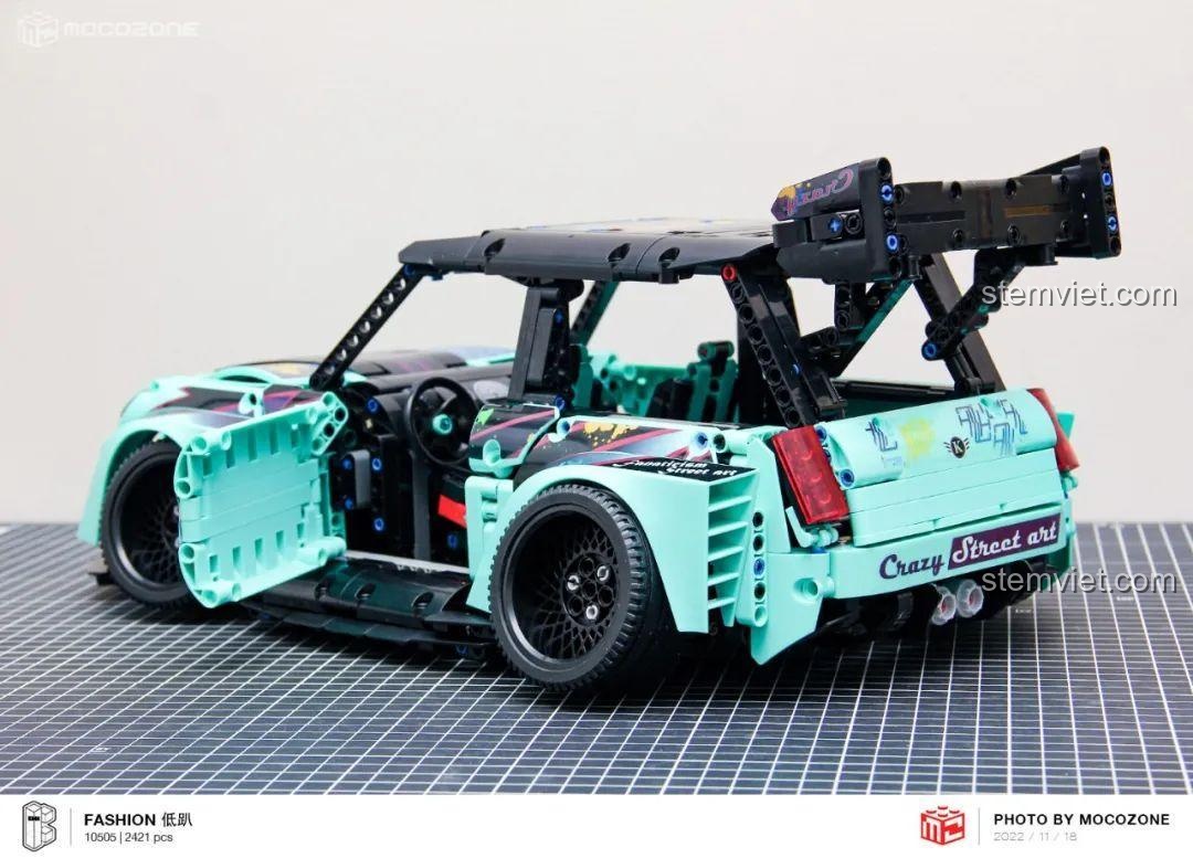 Mô hình BMW MINI gầm thấp K-Box 10505 với cửa mở và decal hoàn chỉnh.