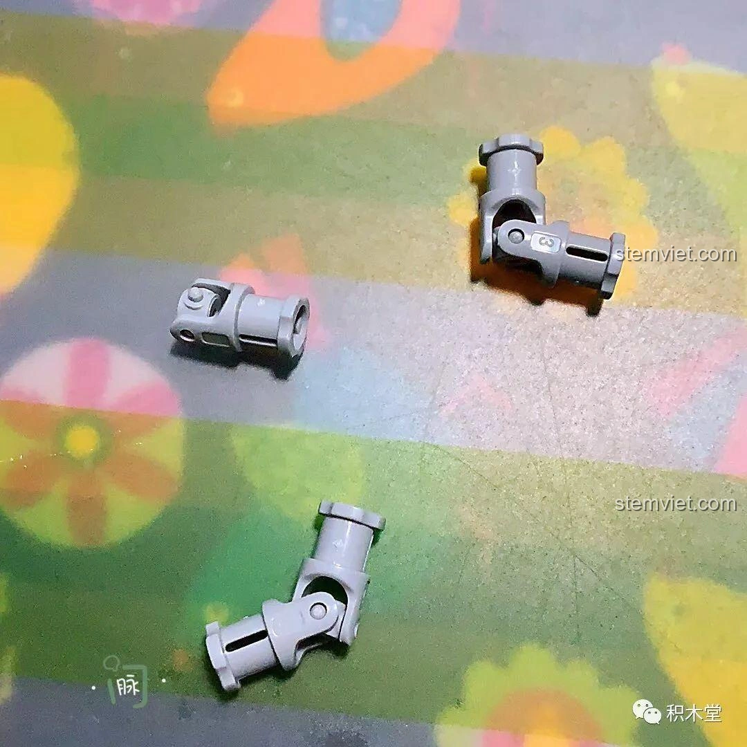 Ba khớp xoay màu xám, một chi tiết quan trọng cho các mô hình có khả năng chuyển động trong bộ lắp ráp Sheng Yuan.