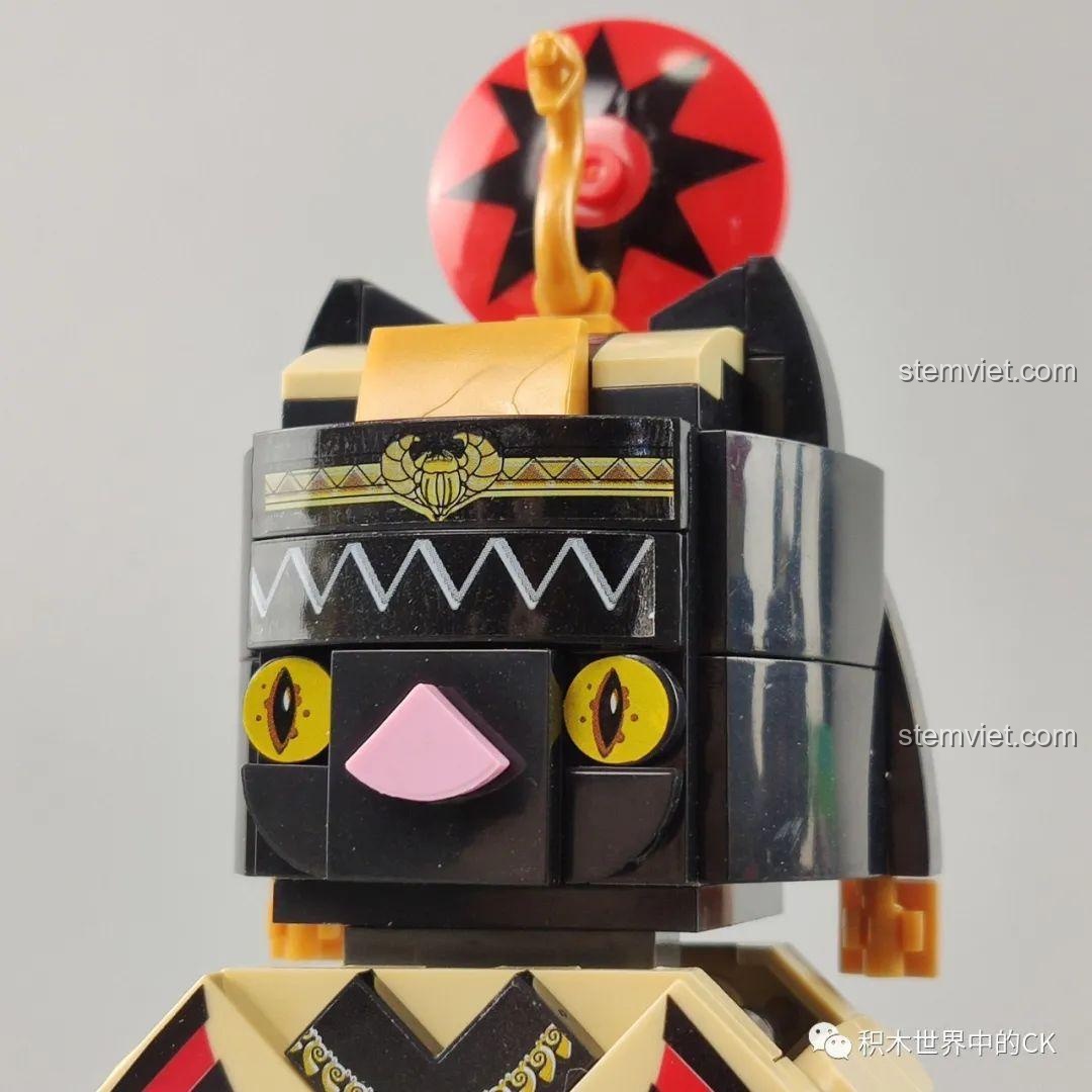 Cận cảnh khuôn mặt của mô hình Nữ Thần Bastet, với đôi mắt to tròn và biểu cảm ngộ nghĩnh, từ bộ lắp ghép Nữ Thần Bastet CW2002 A.