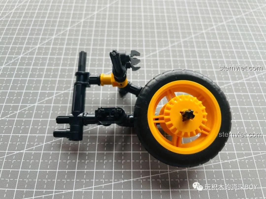 Lắp ráp bánh trước và hệ thống lái của bộ lắp ráp xe điện ZHEGAO QL1268.