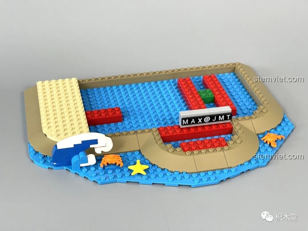 Quá trình lắp ráp phần đế của sa bàn Pantasy 86401 Thủy thủ Popeye, với các chi tiết biển và cát.