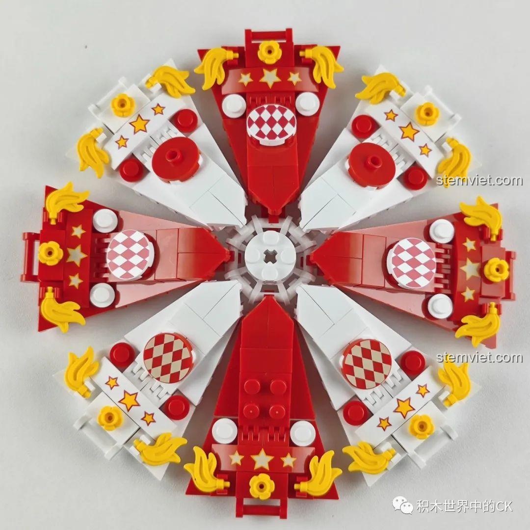 Lắp ráp phần mái vòm của Hộp nhạc thông minh Công viên giải trí ánh sao JAKI JK1366 với các chi tiết trang trí tinh xảo. Đánh giá JAKI JK1366 Đồ chơi hộp nhạc DIY.