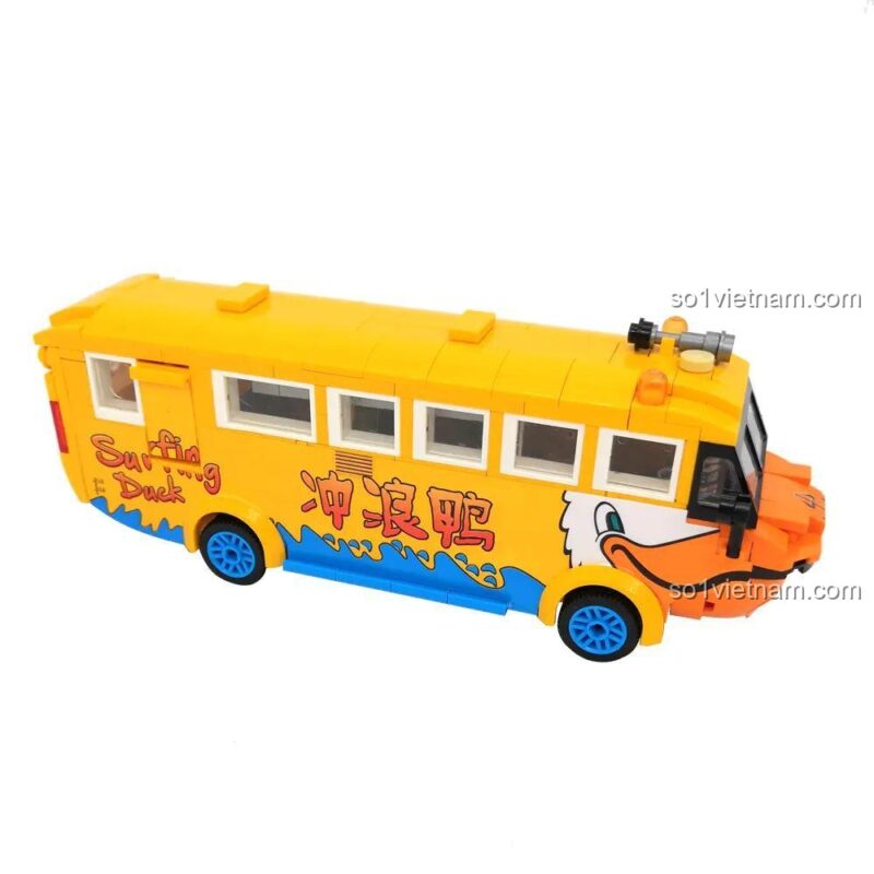Cận cảnh bộ xếp hình 1115 Xe Buýt Du Lịch Vịt Vui Nhộn, thể hiện các chi tiết cửa sổ và thân xe.