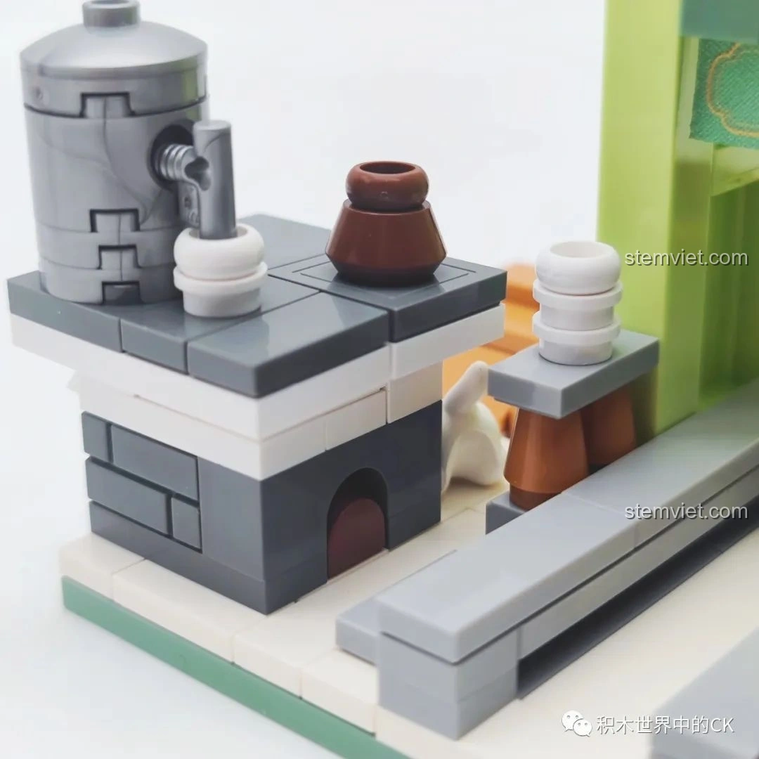 Các mảnh ghép và hướng dẫn lắp ráp bên trong hộp xe đẩy trà thảo mộc Vương Lão Cát.