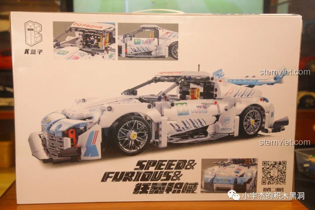 Mặt sau của hộp KBOX 10214 Xe đua Porsche 911 GT3 RS hiển thị các góc nhìn và chi tiết của mô hình.