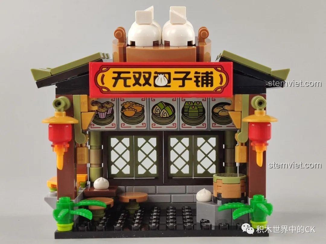 Góc nhìn khác của mặt tiền Tiệm Bánh Bao Vô Song QMAN 72012, thể hiện sự cân đối của kiến trúc.