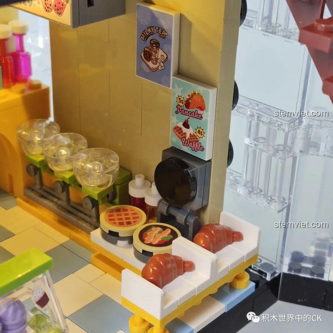 Khu vực máy làm đồ uống trong mô hình Cửa hàng trà sữa JIAZHI SY 5209, với các bình đựng nguyên liệu.