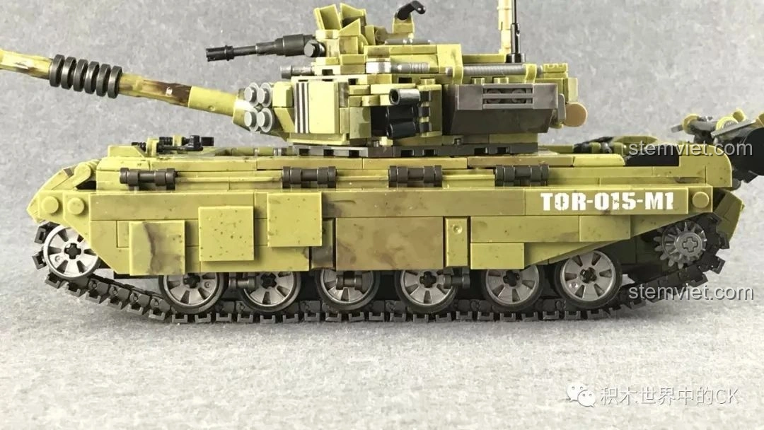 Minh họa hoạt động của hệ thống treo độc lập trên xe tăng Thiên Hổ Scorpio Tiger XB-06015 bằng một mảnh ghép màu vàng.