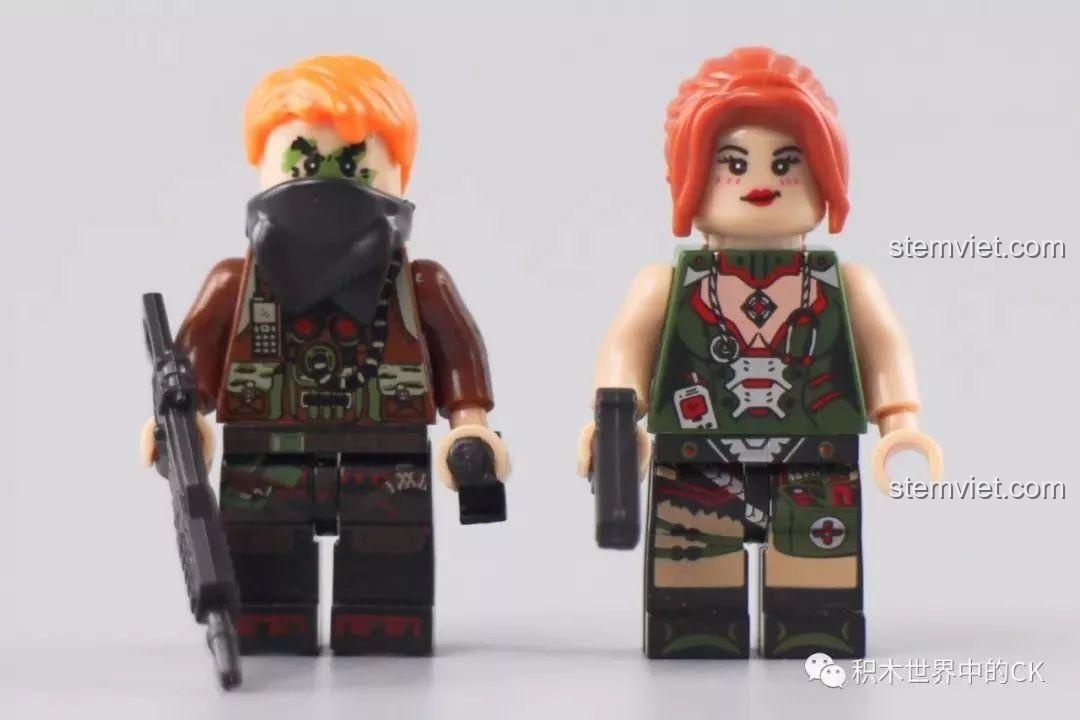 Hai minifigure phe người: nam chiến binh tóc cam và nữ chiến binh tóc đỏ trong bộ Winner 5061.