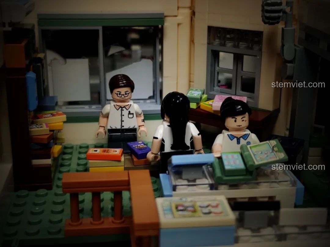 Các minifigure học sinh đang lựa sách trong hiệu sách của mô hình Wekki 516954.