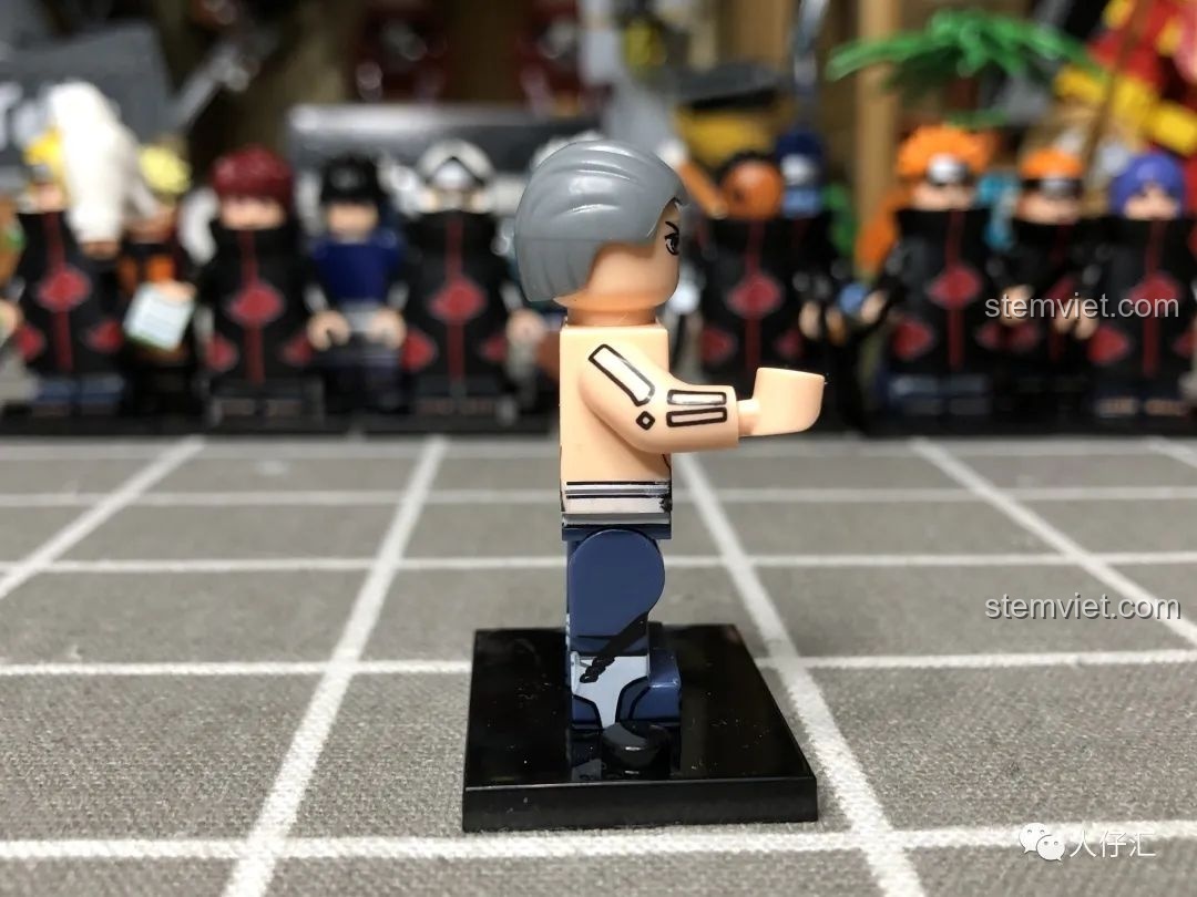 Cận cảnh khuôn mặt của minifigure Hidan WM2086, với đôi mắt và biểu cảm đặc trưng.
