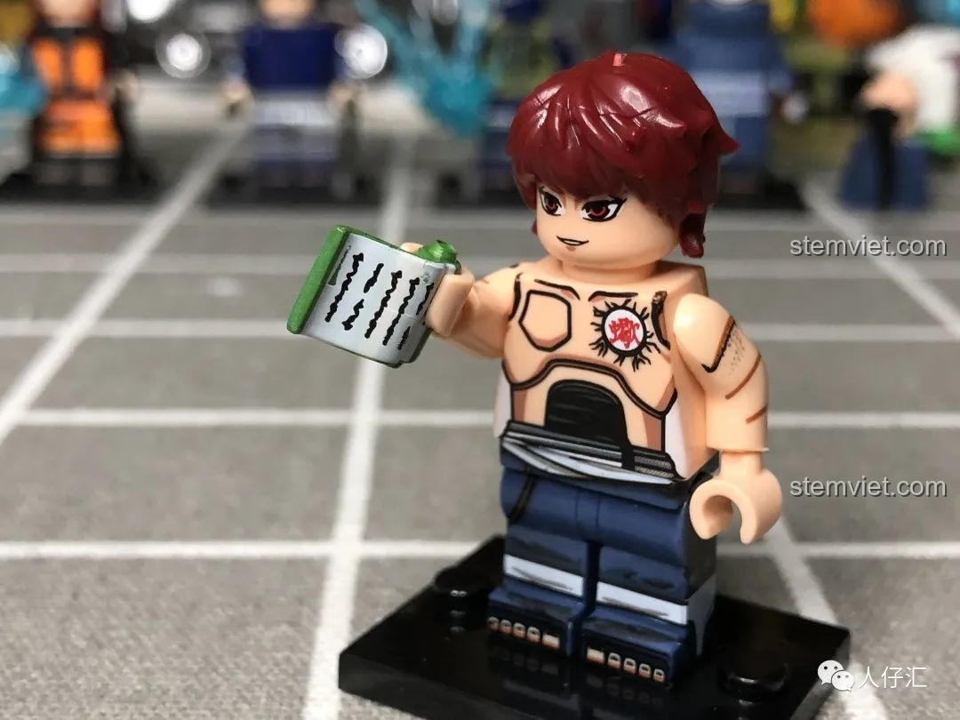 Minifigure Hidan WM2086 từ bộ đồ chơi lắp ráp Naruto Akatsuki, với áo choàng và lưỡi hái đặc trưng.