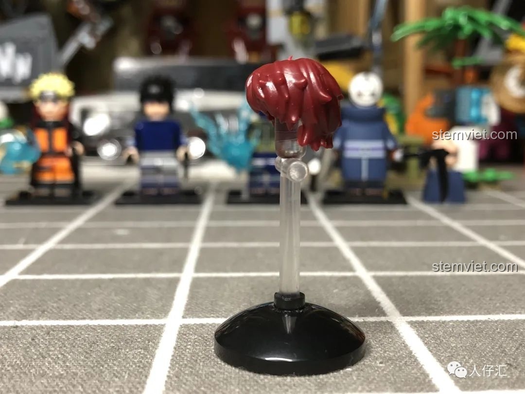 Góc nghiêng của phụ kiện cuộn giấy minifigure Sasori WM2085, cho thấy độ dày và hình dáng.