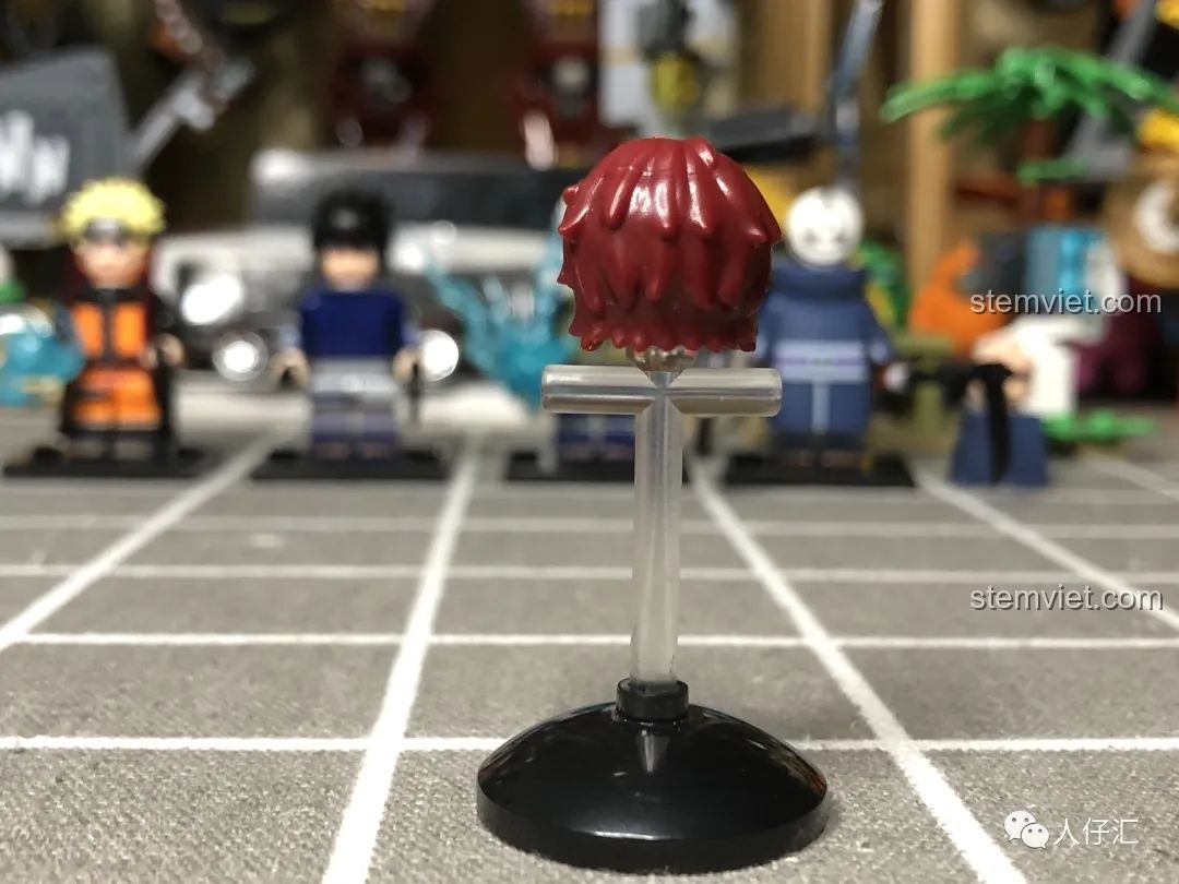 Phụ kiện cuộn giấy đi kèm minifigure Sasori WM2085, chi tiết in ấn trên cuộn giấy.