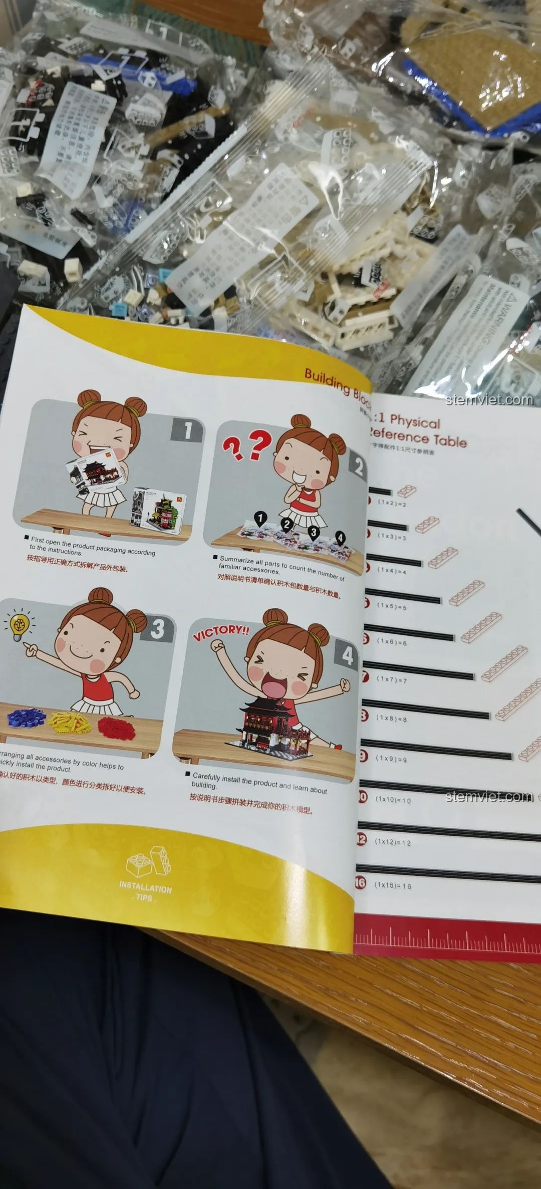 Ảnh thực tế vòng quay London Eye trong sách hướng dẫn mô hình WANGE 6215, giúp người chơi hình dung rõ hơn về công trình.