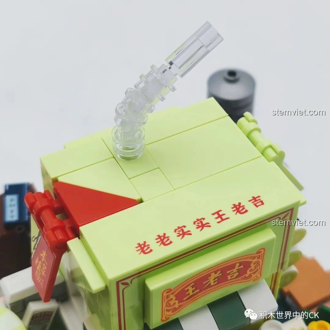 Mô hình xe đẩy trà thảo mộc Vương Lão Cát hoàn chỉnh, nhỏ gọn và chi tiết.