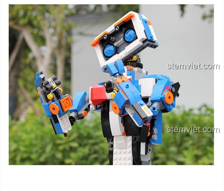 Cận cảnh phần thân trên của Robot Aimubot 13063, làm nổi bật chi tiết mắt, nơ và cánh tay. Bộ lắp ráp Mould King 13063 tinh xảo.