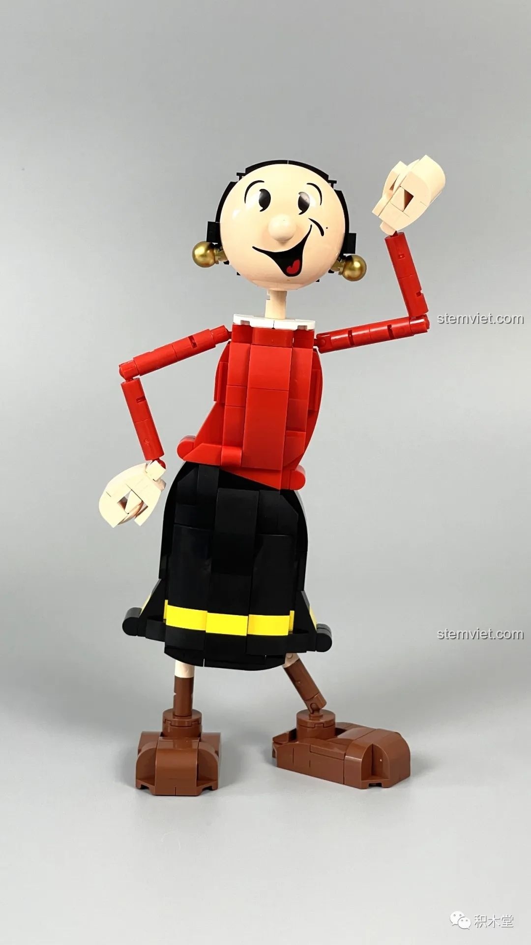 Mô hình Olive Oyl Pantasy 86401 tạo dáng vẫy tay chào, thể hiện sự linh hoạt.