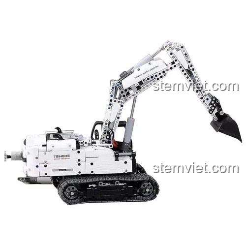Bé trai 8 tuổi đang vui vẻ lắp ráp bộ đồ chơi mô hình Máy xúc công trình ONEBOT GCWJJ01IQI trên sàn nhà. Món quà sinh nhật ý nghĩa giúp bé rèn luyện kiên nhẫn.