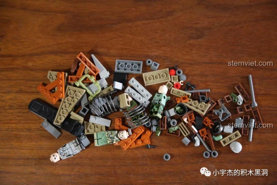 Mảnh ghép của Panlos Brick 631006 Xe Tải Pháo Phản Lực Land Stuka được đổ ra, sẵn sàng cho quá trình lắp ráp đầy thú vị.