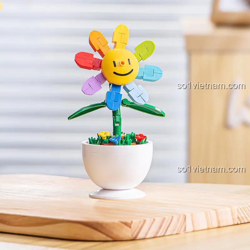 Mô hình hoa mặt trời 7 màu rực rỡ từ bộ lắp ghép Pleyerid M38-B1073. Món quà sáng tạo cho bé gái.