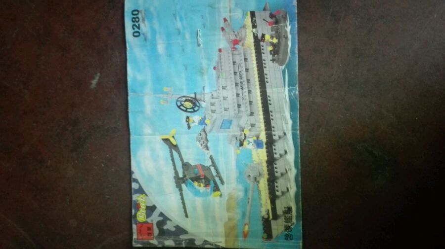 Sách hướng dẫn lắp ráp của bộ đồ chơi mô hình Tàu chiến QMAN 0280, một món đồ chơi quân sự giá rẻ cho bé trai 7 tuổi.