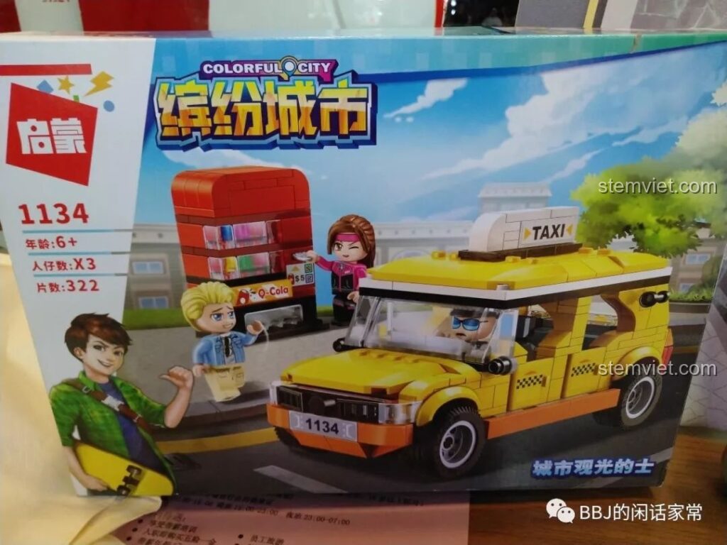 Hộp của bộ lắp ráp QMAN 1134 Xe Taxi Vàng với hình ảnh minh họa chiếc xe và máy bán nước tự động.