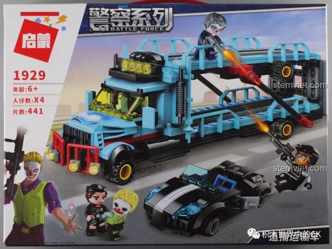 Mặt trước hộp bộ lắp ráp QMAN 1929 Xe Vận Chuyển Tội Phạm, mô tả cảnh truy đuổi giữa siêu xe cảnh sát và xe tải.