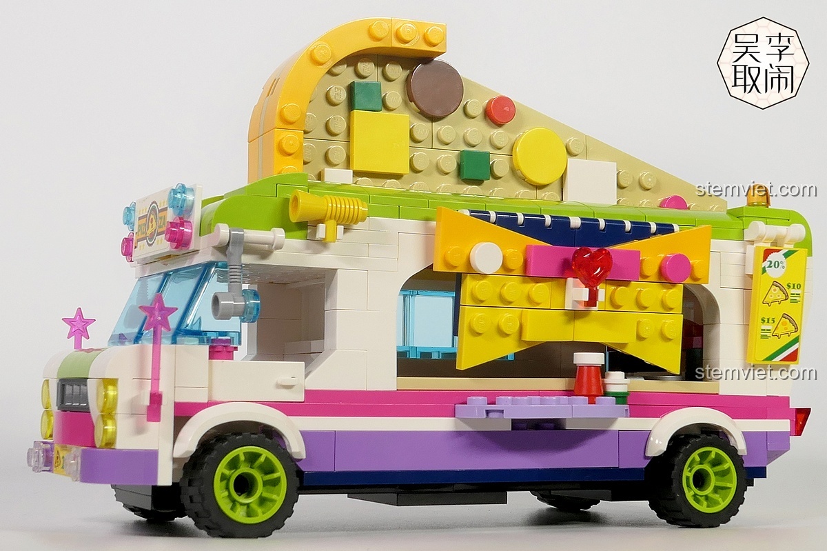 Mô hình Xe Tải Pizza Vui Vẻ QMAN 2013 hoàn chỉnh nhìn từ bên hông, với màu sắc tươi sáng và thiết kế độc đáo.