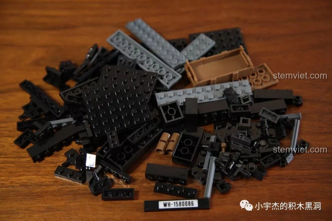 Toàn bộ linh kiện bước 1 của bộ đồ chơi lắp ghép Xe kéo quân sự Đức Quốc xã RSO/03 QUANGUAN 100086.