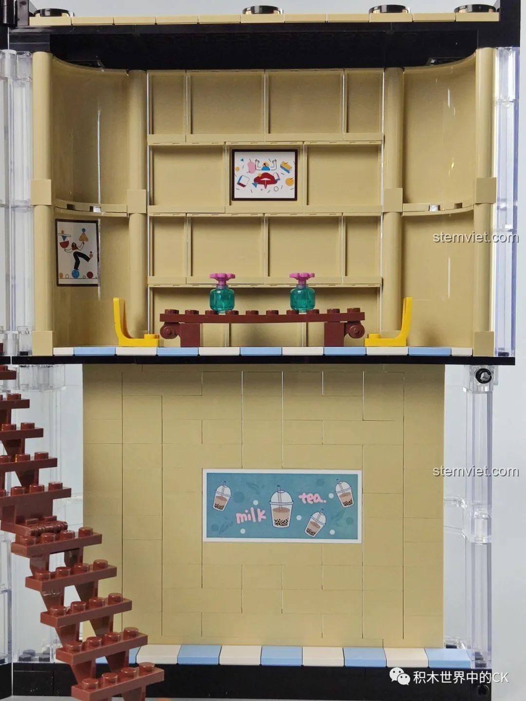 Khu vực quầy pha chế và bếp tầng trệt của mô hình Cửa hàng trà sữa JIAZHI SY 5209, với các chi tiết đồ ăn.