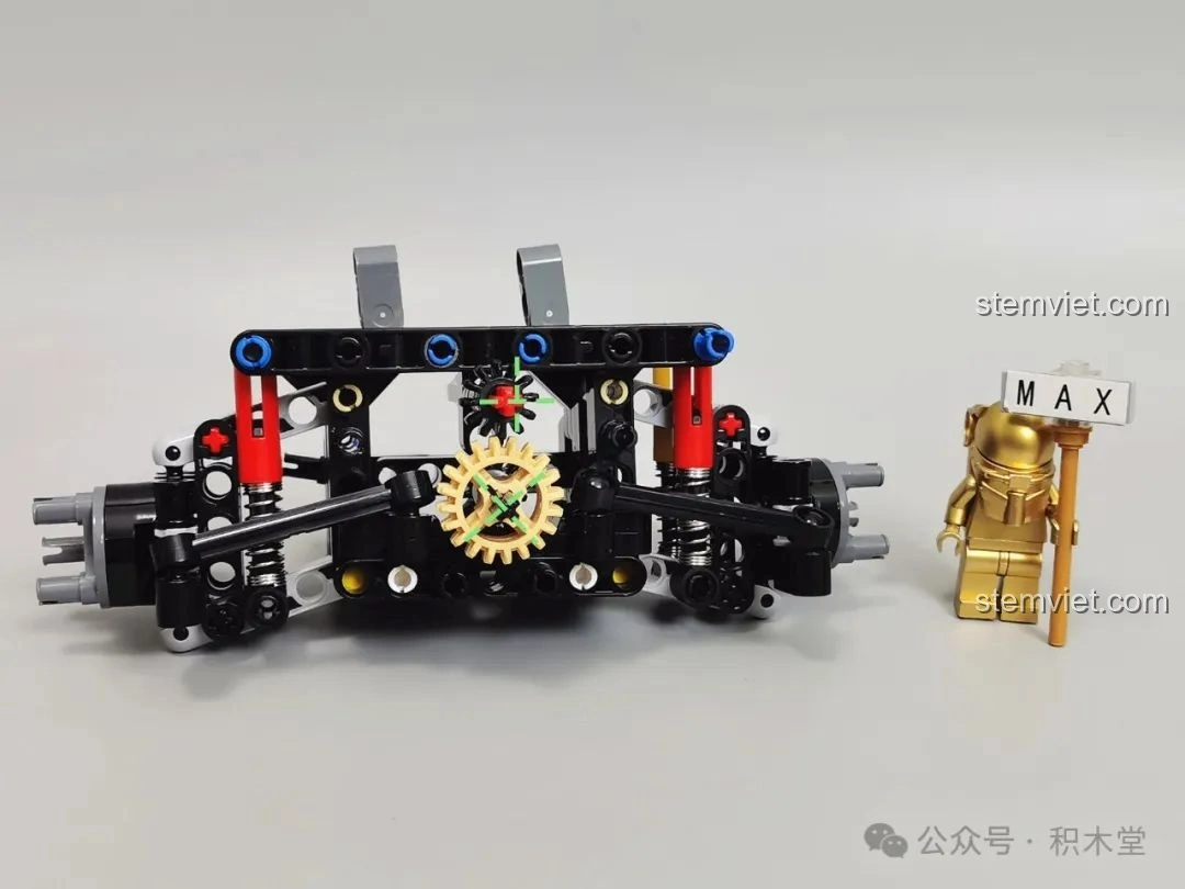 Hệ thống treo và bánh răng đã lắp ráp của bộ RASTAR 92700 Audi RS Q e-tron, cho thấy độ phức tạp và chính xác của cơ cấu.