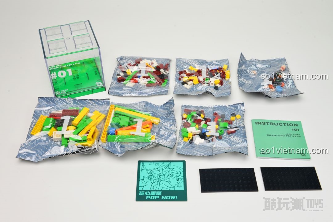 Các túi mảnh ghép và sách hướng dẫn của mô hình AREA-X AX0080 Pop Life, sẵn sàng cho quá trình lắp ráp.