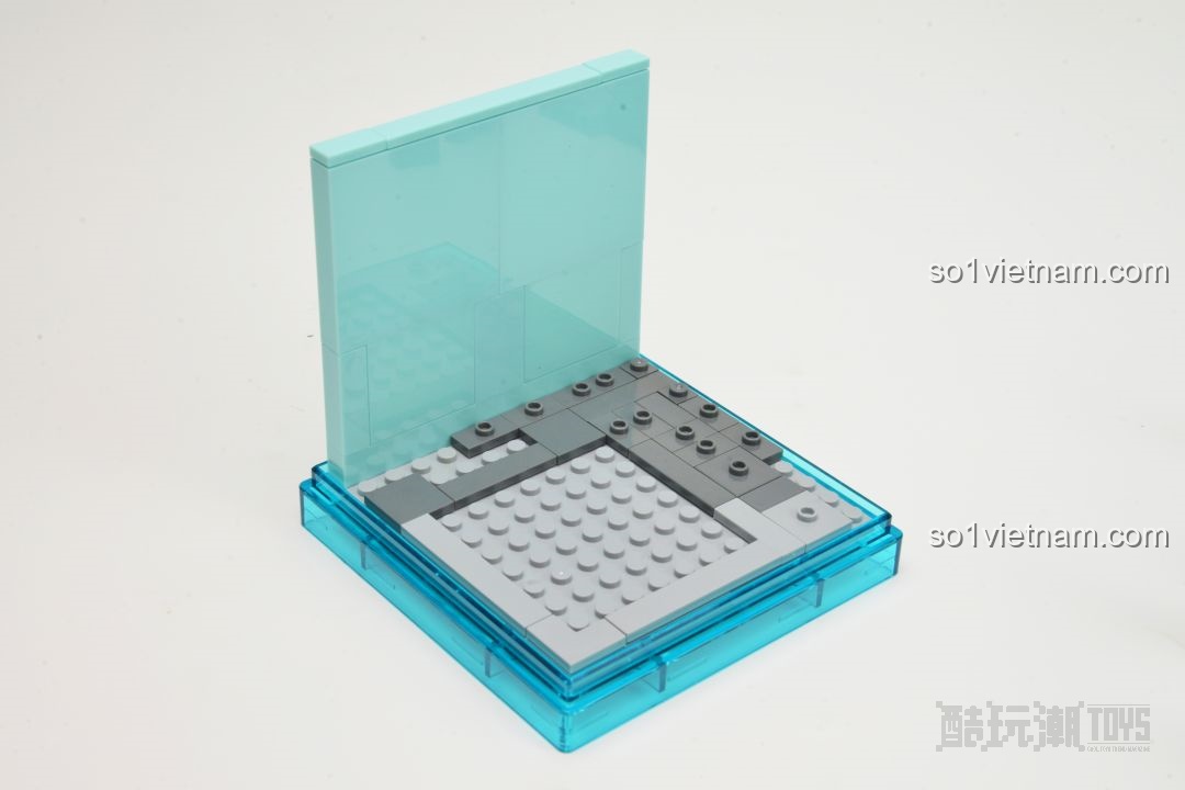 Các tòa nhà cao tầng màu xám của mô hình AREA-X AX0081 City Park dần thành hình, tạo khung cảnh đô thị.