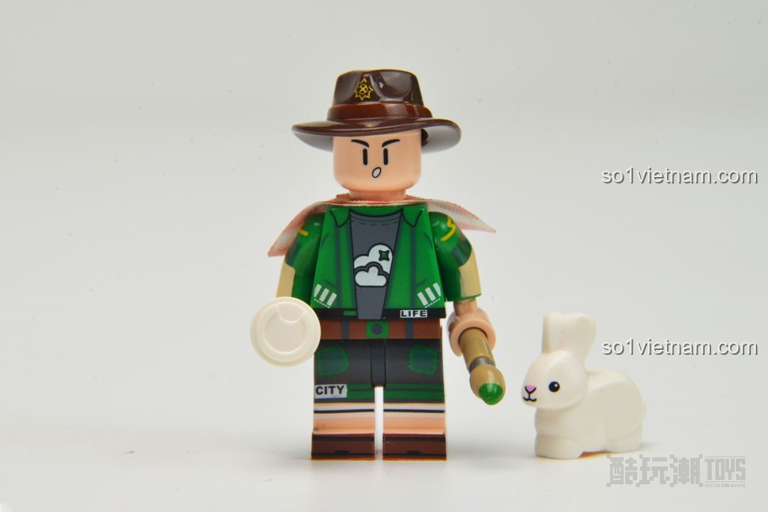 Bắt đầu lắp ráp mô hình AREA-X AX0082 Caudex House với nền vàng và tường đen, tạo sự tương phản độc đáo.